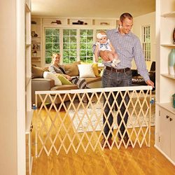 North States 60″ Wide Expandable Swing Baby Gate: Equipped with a safety rail that automat ...